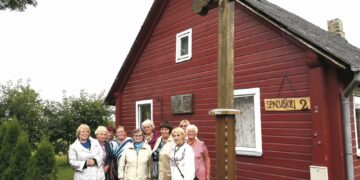 Su tėviškės vaizdu širdy