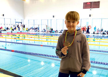 Lietuvos vaikų plaukimo čempinote nuskynė medalį