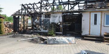 Degė ūkinis pastatas